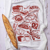 Kei & Molly Bread Flour Sack Dish Towel printed in Rust color, with Props