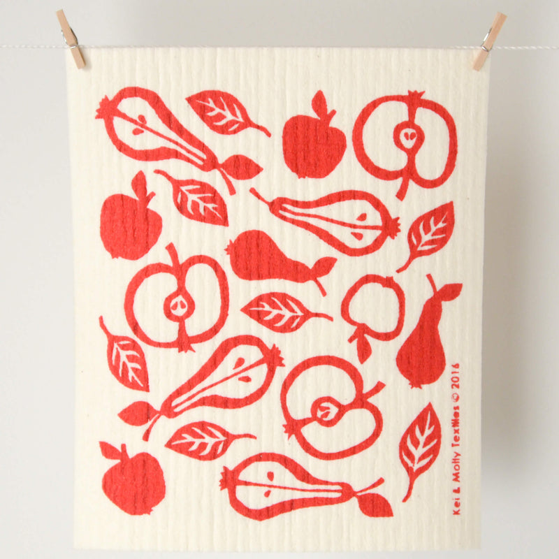 Kei & Molly Textiles: Reusable Sponge Cloth Apples & Pears pattern in red hanging from a laundry line.