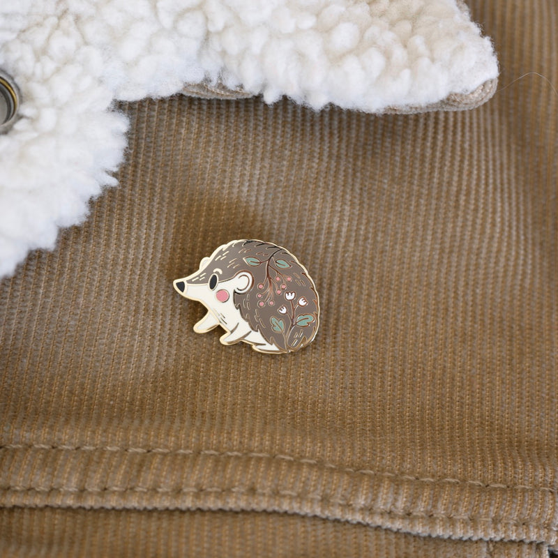 Hedgehog enamel pin designed by Justine Gilbuena