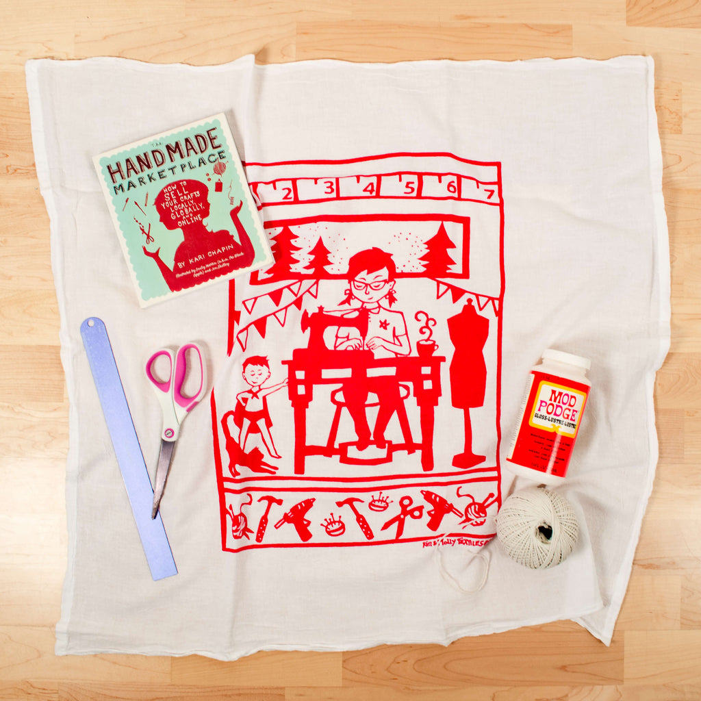 Kei & Molly Crafter Flour Sack Dish Towel in Raspberry Full View with sewing supplies.