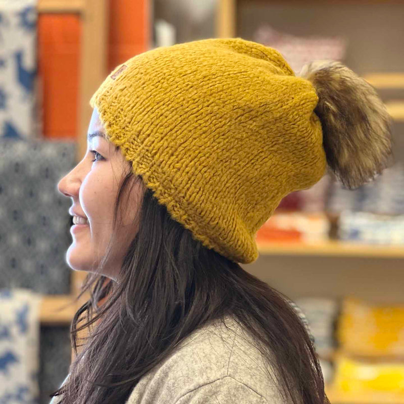 Woolk Wool Winter Hats: Mustard. Model.