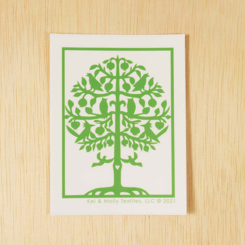 Kei & Molly Vinyl Sticker: Tree of life in green.