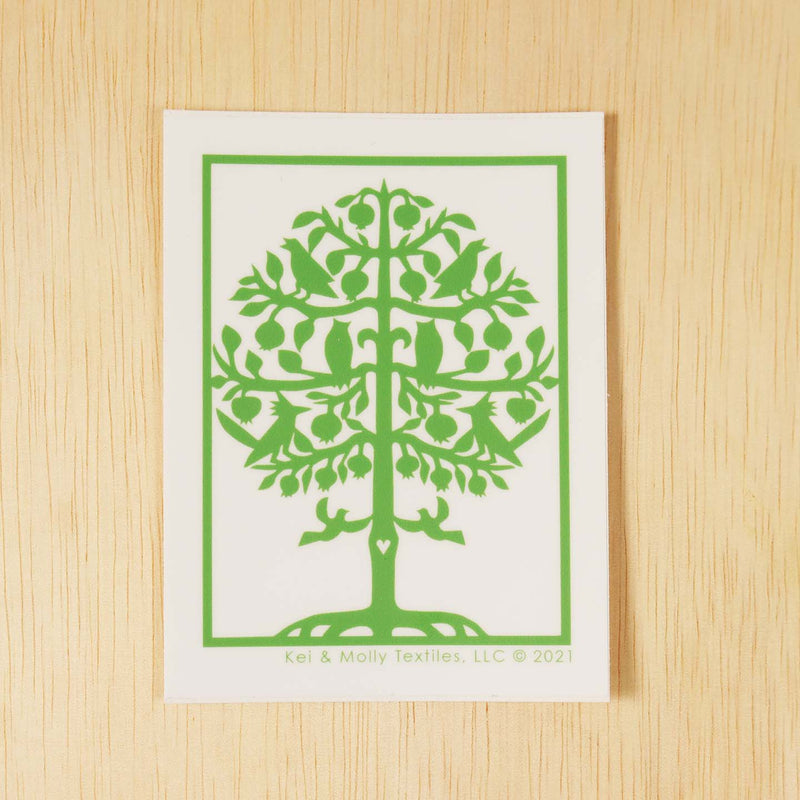 Kei & Molly Vinyl Sticker: Tree of life in green.