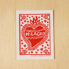 Kei & Molly Vinyl Sticker: Milagro in red.