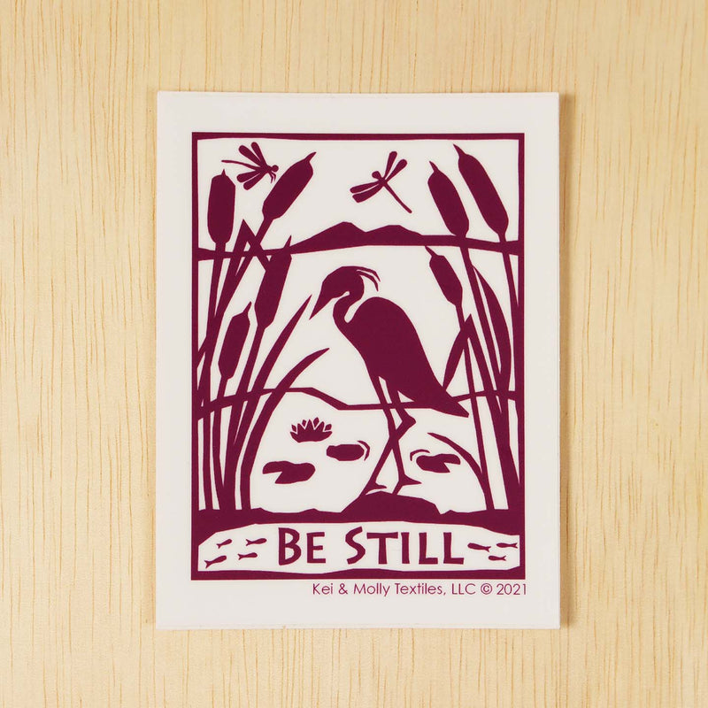 Kei & Molly Vinyl Sticker: Be Still in purple.