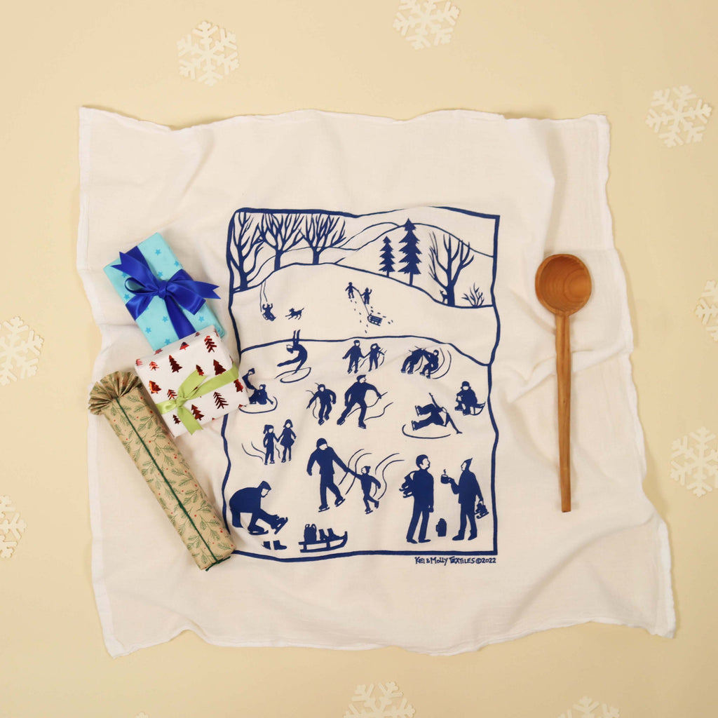 Flour Sack Dish Towel: Ice Skaters in Marina Blue.