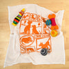 Kei & Molly Dogs Flour Sack Dish Towel in Orange with Props