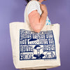 Kei & Molly Tote Bag with Books Design in Indigo Held by Model