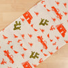 Kei & Molly Table Runner in Pueblo Design In Desert Coral and Olive