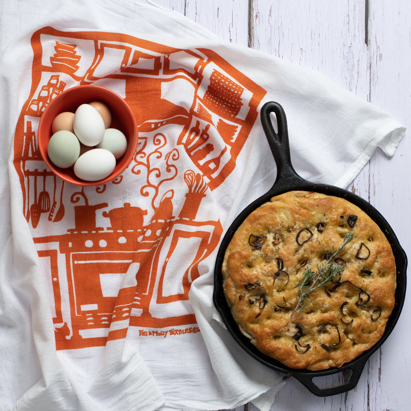 Kei & Molly Flour Sack dish Towel: Kitchen in orange. Focaccia and eggs props.