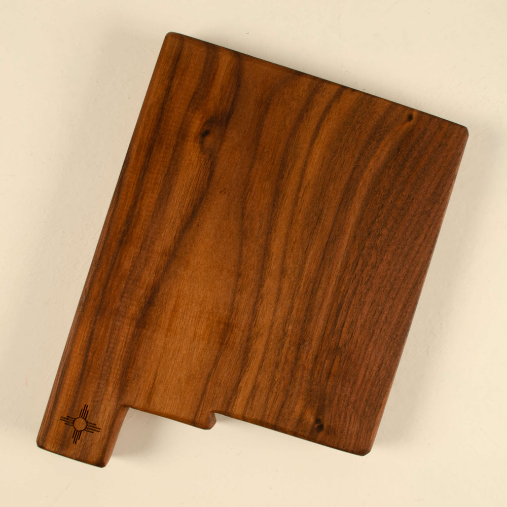 https://www.keiandmolly.com/cdn/shop/products/NMsmallcuttingboard-walnut_1000x.jpg?v=1619191331