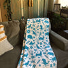 Buffalo & Friends Turquoise Cotton Throw on Couch