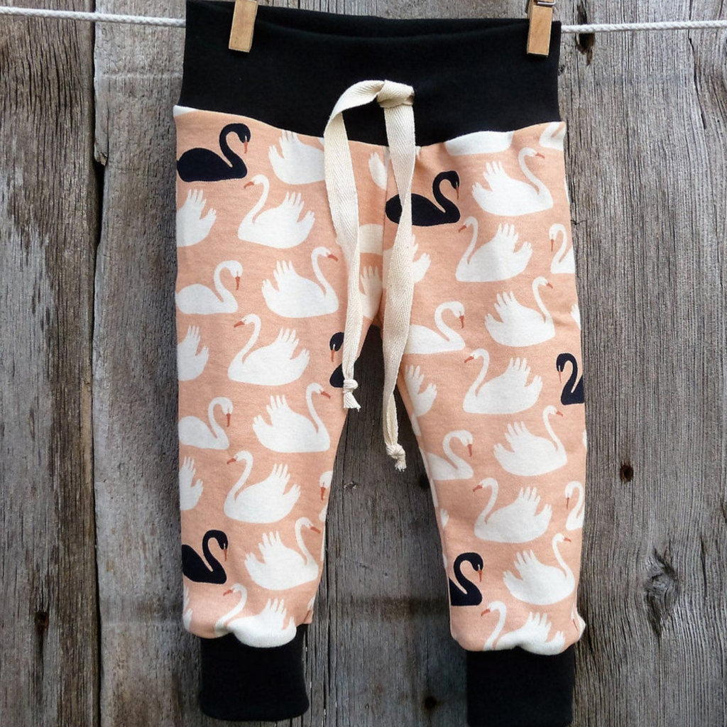 Baby pants by Kinder Sprout: swans, front view